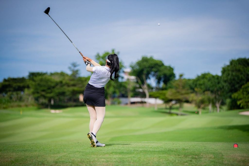 condominium resident playing golf