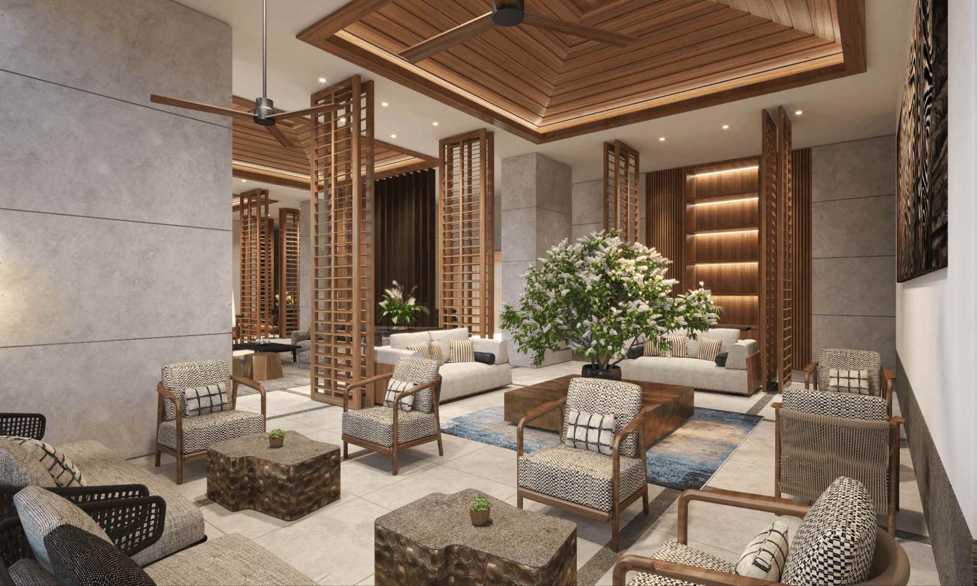Elegant luxury condominium lounge with wood ceiling details, patterned armchairs, neutral finishes, and indoor greenery