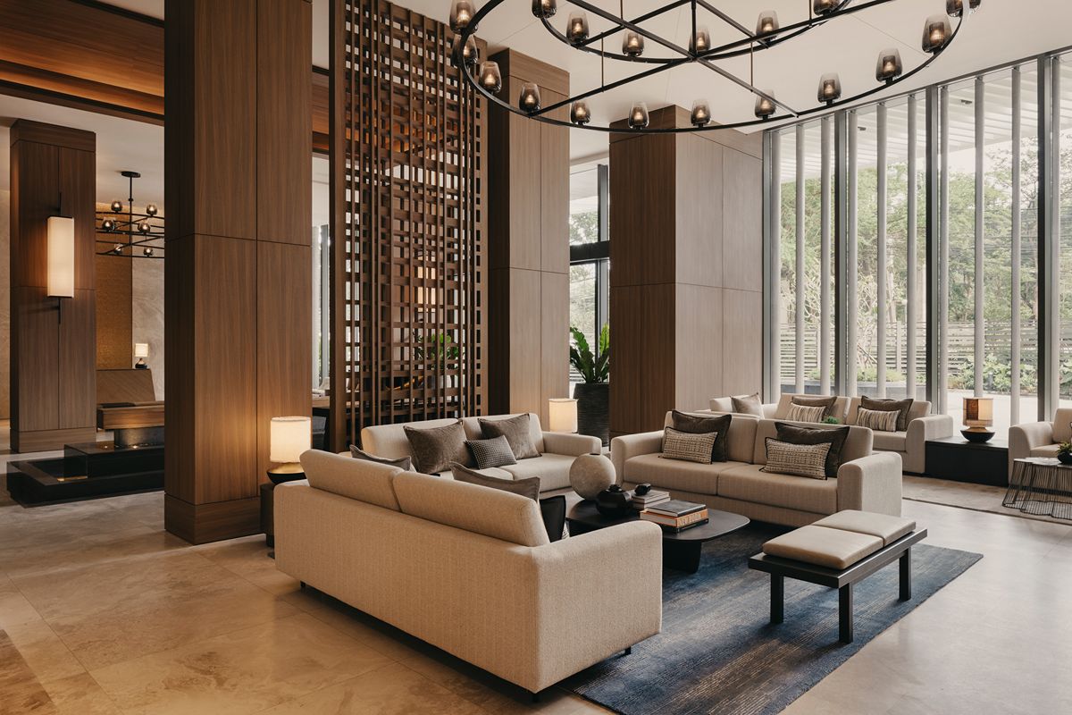 Elegant lounge interior at Shang Residences at Wack Wack with spacious seating, floor-to-ceiling windows, and refined modern finishes